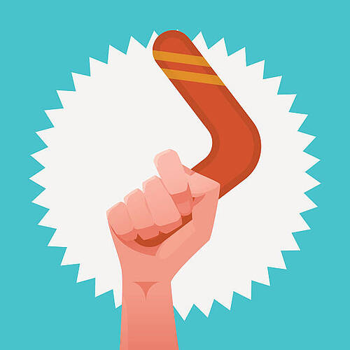 hand-holding-a-boomerang