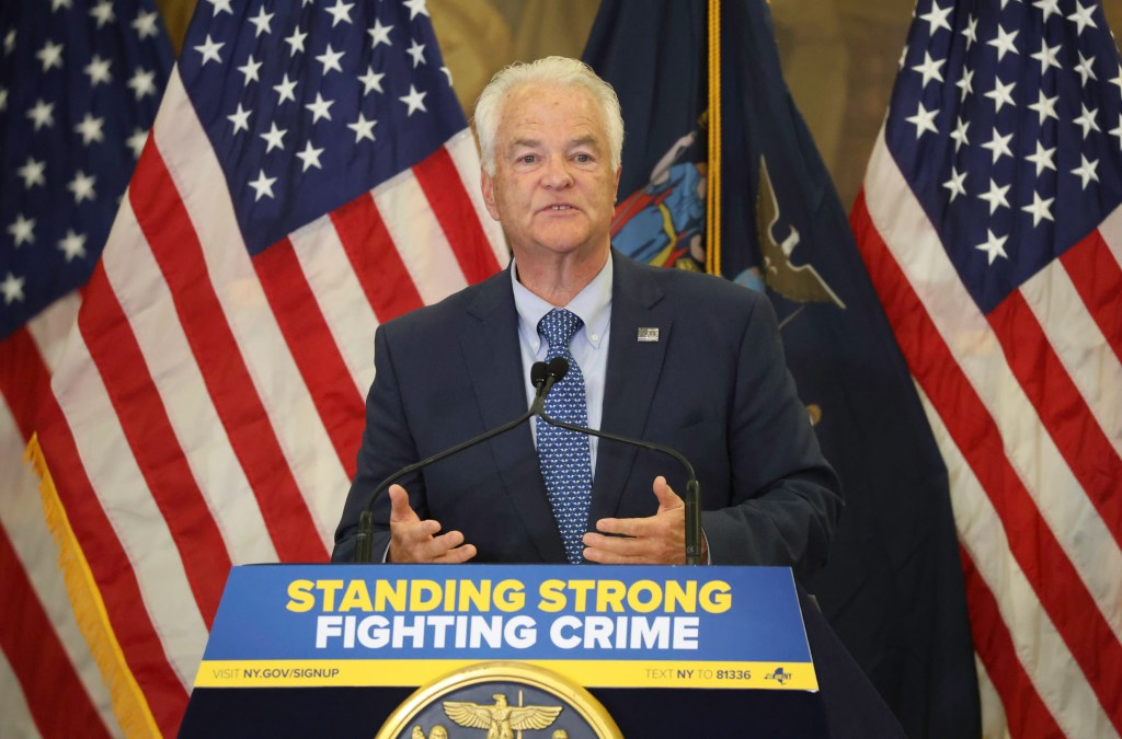 Staten Island DA Mike McMahon speaking at a press conference.